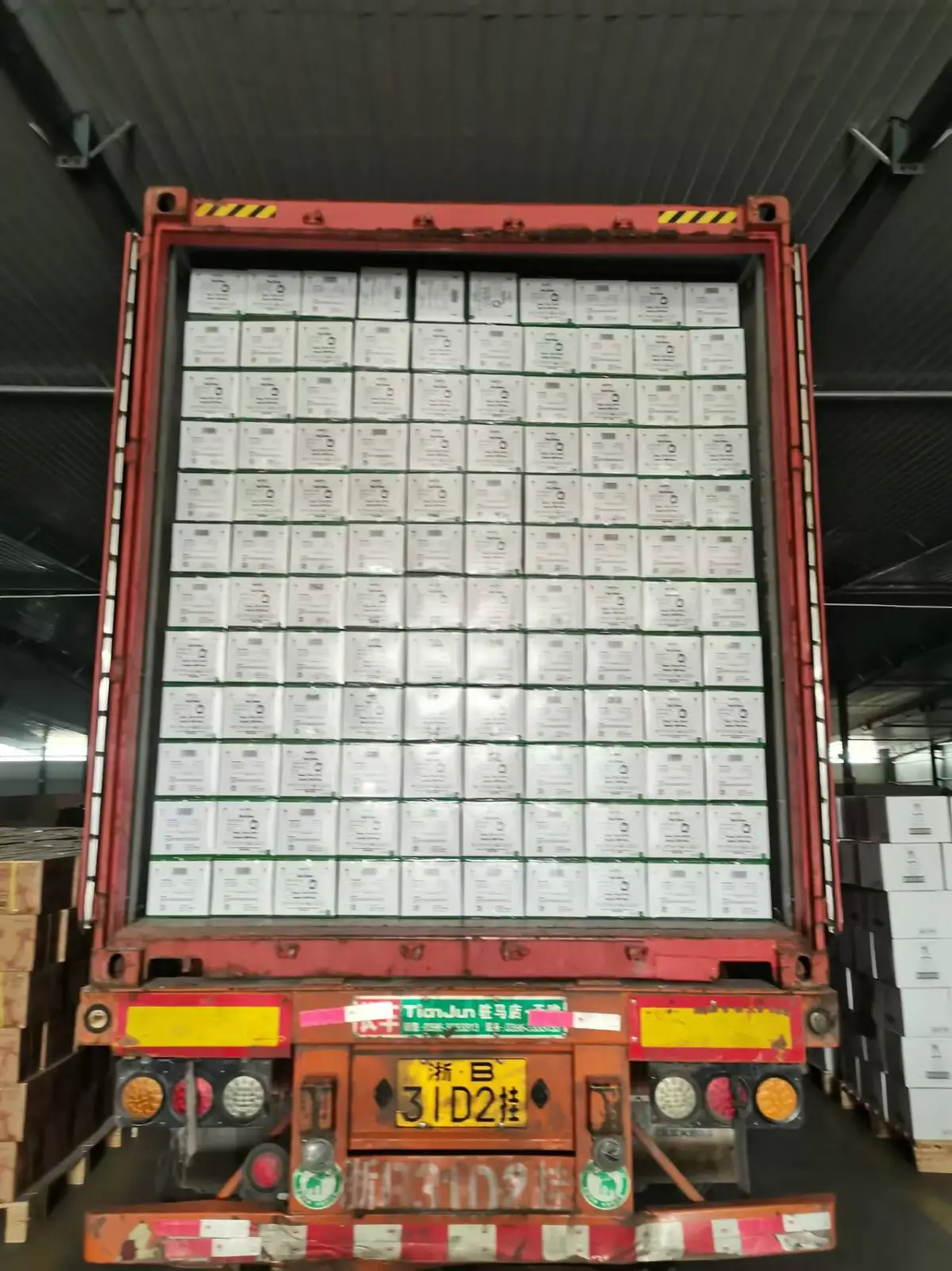 Full container of disposable glove cartons
